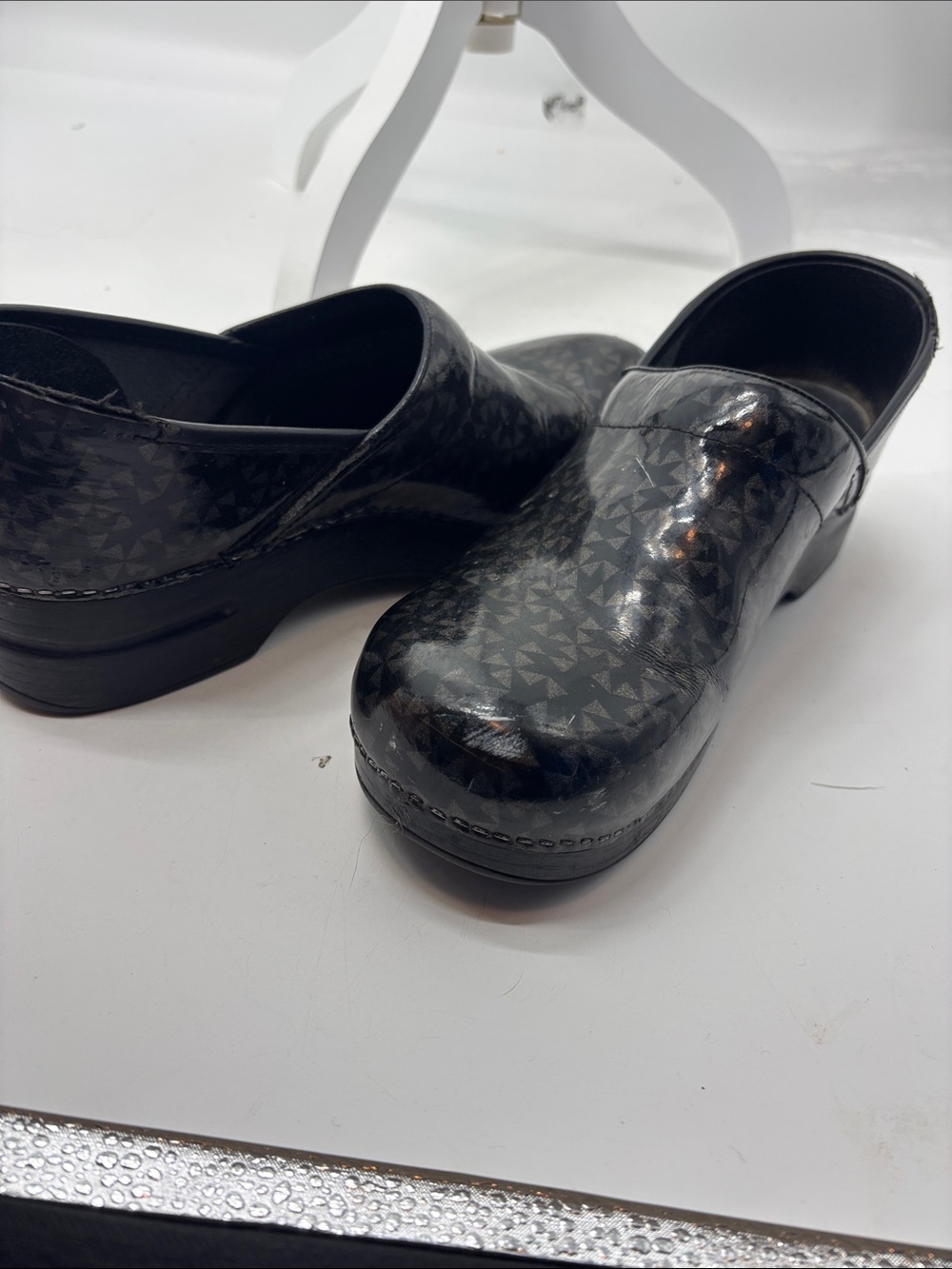 Dansko Black Geometric Slip-On Clogs